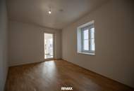 Neubauwohnung im Stadtzentrum mit Ausbaupotenzial &amp; Dachterrasse