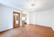 RUHELAGE NAHE JAKOMINIPLATZ | 2-Zimmer-Wohnung mit neuer Küche und Blick in den grünen Innenhof