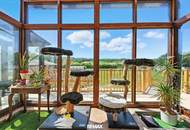 High-end living in a peaceful green location! A feel-good retreat in a class of its own: tradition meets state-of-the-art comfort!