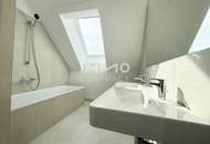 BEIM DONAUUFER: Klimatisierte 3-Zimmer-Dachgeschosswohnung mit sonnigem Glasbalkon