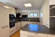 Modernes Wohnhighlight im Grünen: 3-Zimmer mit Garten-Balkon und 2 Garagenplätzen