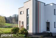 Attraktives Einfamilienhaus im Bauhaus-Stil auf einem großen, naturbelassenen Grundstück