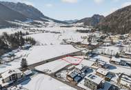 Sonniges Baugrundstück mit Bebauungsstudie für 6 Wohneinheiten in attraktiver Lage von Kössen