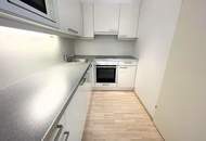 Erdgeschoß, barrierefrei, Innenhof! Ruhige, loft-artige Neubauwohnung mit 2 kl. Terrassen