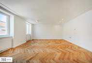 Energetisch revitalisierter Altbau: Hochwertige 4-Zimmer-Wohnung mit Balkon in zentraler Lage