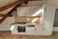 Geförderte Dachgeschosswohnung im 2. Stock mit 62 m²