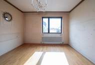 Charmantes Zweifamilienhaus mit traumhaftem Garten und Garage in Christkindl