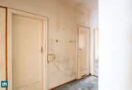 SANIERUNGSBEDÜRFTIGE 2 - ZIMMER WOHNUNG MIT FREIFLÄCHE UND GRÜNBLICK