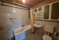 Mehrfamilienhaus mit Geschäftslokal