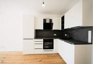 MODERNE 2-ZIMMER BALKONWOHNUNG - ERSTBEZUG UND TIEFGARAGENPLATZ