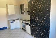 "Jungfamilienwohnung mit Garten und Parkplatz"