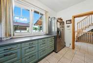 High-end living in a peaceful green location! A feel-good retreat in a class of its own: tradition meets state-of-the-art comfort!