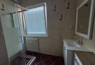 Erdgeschosswohnung mit Garten & viel Lagerfläche