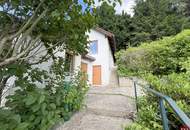Einfamilienhaus auf großem Grund mit Sanierungsbedarf