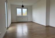 Erdgeschoßwohnung mit Gartenanteil in zentraler Lage