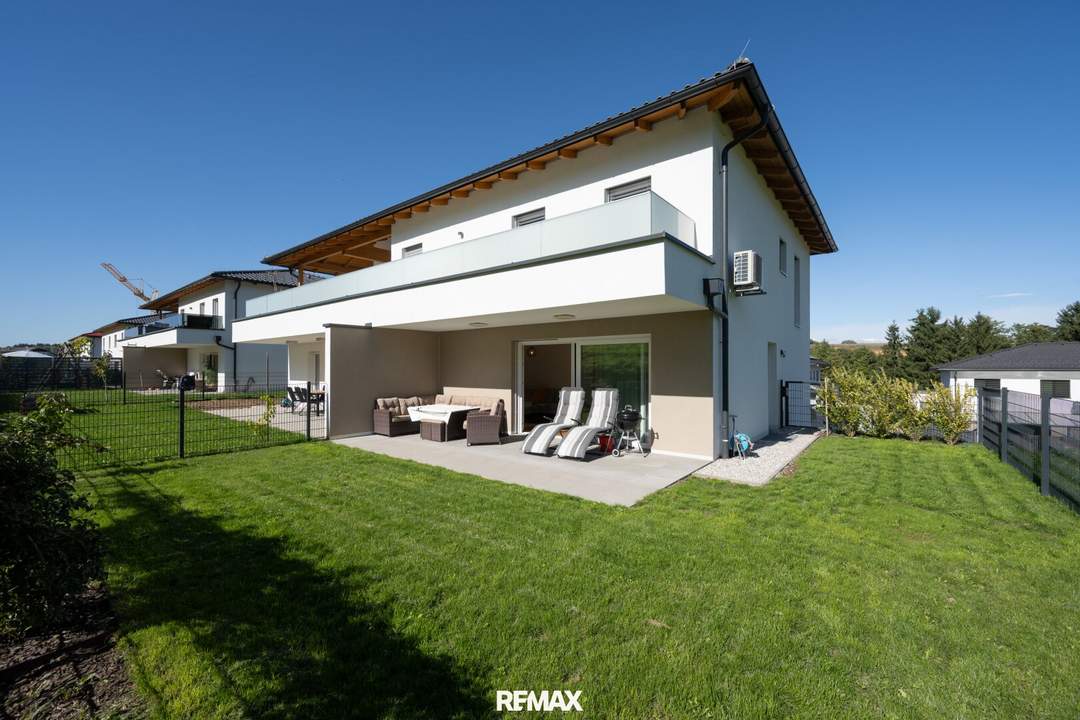 NEUBAU | Hochwertige Gartenwohnung mit traumhafter Küche, Terrasse und Garage in ruhiger Grünlage!
