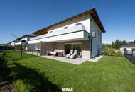 NEUBAU | Hochwertige Gartenwohnung mit traumhafter Küche, Terrasse und Garage in ruhiger Grünlage!