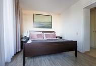 1170 AM HEUBERG: GROßZÜGIGER FAMILIENWOHNSITZ MIT INDOORPOOL, WELLNESS, GARTEN & WIEN-BLICK