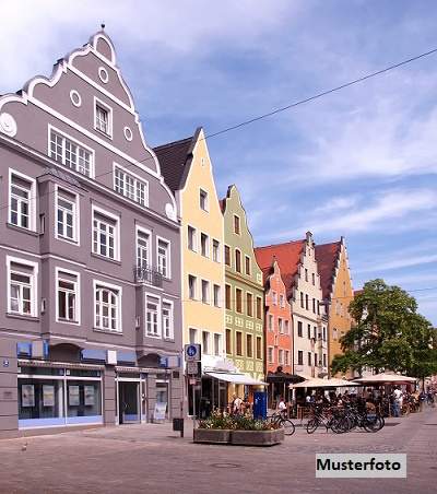Historisches Wohn- und Geschäftshaus mit modernem Neubautrakt und Dachterrasse