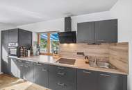 Modernisierte 2-Zimmer Gartenwohnung mit zwei Stellplätzen in ruhiger Wohnlage in Radfeld zu kaufen!