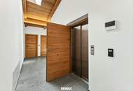 Mit dem Lift direkt in Ihr neues exklusives Penthouse mit Glaskamin und Traum Ausblick in Aurach bei Kitzbühel -