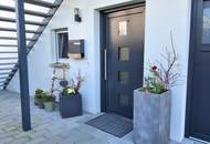 Moderne Gartenwohnung mit großzügigen Terrassen in sonniger Ruhelage