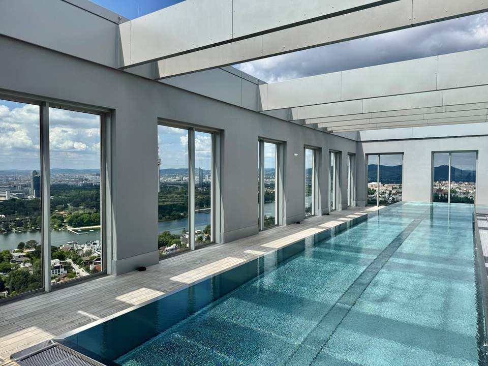 Design trifft Ausblick - 2 Zimmer Wohnung mit Pool am DACH - U1 vor der Türe