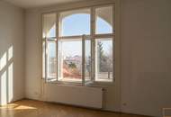 Unbefristete und zentral begehbare Altbauwohnung mit Balkon und Bulthaup-Küche