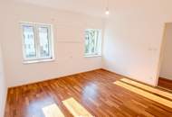 2-Zimmer-Mietwohnung mit 80 m² Eigengarten und PKW-Abstellplatz