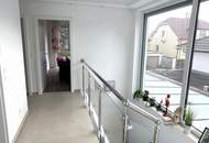 FAMILIENDOMIZIL MIT GARTEN UND GARAGE
