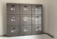 Miethaus mit 9 Wohnungen, Gemeinschaftsgarten und Carports