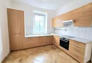 Mehrparteienhaus mit Parkplätzen im Zentrum von Spittal