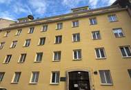 Karmeliterplatz-Charme trifft modernen Komfort – 2-Zimmer-Neubauwohnung mit Stellplatz im Innenhof.