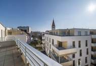 Exklusive Dachgeschoßwohnung mit Traumküche &amp; Sonnenterrasse | Erstbezug | Zentrale Lage zwischen Innenstadt und Bahnhof | Tiefgaragenplatz anmietbar