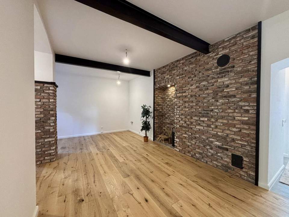 Erstbezug: Stilvolle 3-Zimmer-Wohnung mit Garten und und exklusiver Ausstattung