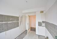 Sanierungsbedürftige Eigentumswohnung mit großzügiger Terrasse