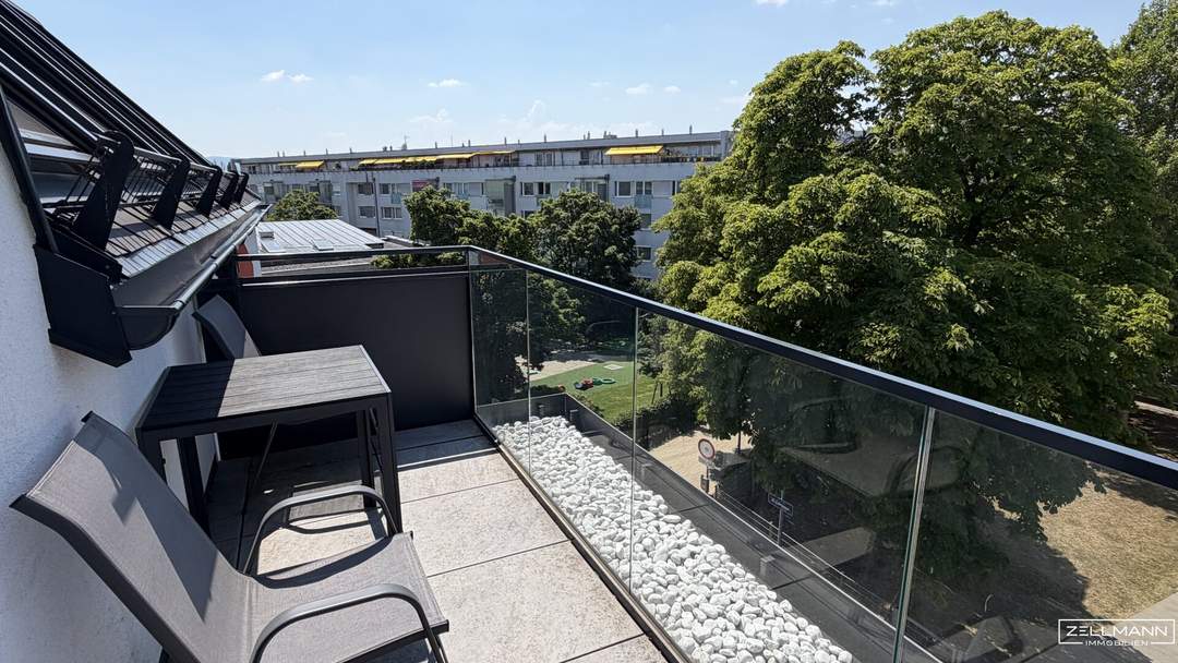 Stilvolle Dachgeschossresidenz mit hochwertiger Ausstattung und urbanem Wohnkomfort | ZELLMANN IMMOBILIEN