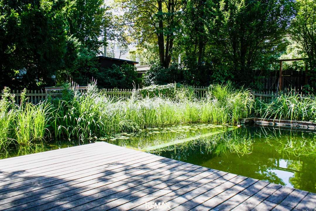 "Familienwohnung mit Schwimmbiotop und Garage!"