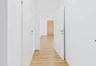 Moderne Erdgeschosswohnung mit Garten, Garage und Blick ins Grüne