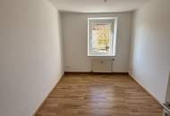 Sonnendurchflutete 2-Zimmer-Wohnung mit herrlichem Grünblick im beliebten Münichholz – liebevoll saniert, mit modernem Wohlfühlbad, praktischen Wohnräumen und perfekter Anbindung für alle, die Ruhe und Stadtnähe zugleich schätzen!