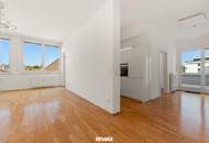 Modernes Wohnen: Helle 4-Zimmer-Wohnung mit weitläufiger Dachterrasse nahe dem Zentrum