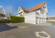 Zwei Etagen, ein Zuhause – Gartenwohnung mit Wohlfühlgarantie und Doppelgarage