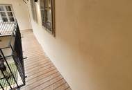 Charmante 2-Zimmer-Altbauwohnung mit Balkon in zentraler Lage