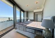 TOP-möbliertes Apartment mit Rundumblick &amp; Goodies (Gym, Pool, Spa, Lounges, Doorman): Neubau-Erstbezug Neue Donau