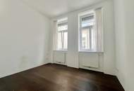 Weitblick, Ruhe & zentrale Lage – Sonnige Altbauwohnung mit Balkon