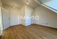 2 Monat Mietzinsfrei: 60m² Dachgeschosswohnung mit Kühlung & Blick über die Felder