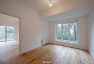 Sanierter Altbau mit modernem Neubau