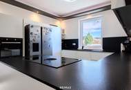 Hochwertiger Neubau mit sonniger Terrasse