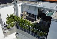 Traumwohnung mit 40 m² Dachterrassen, 2 Garagenplätzen, E-Ladestation und Topausstattung