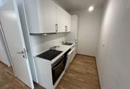 Charmante Neubauwohnung mit Balkon
